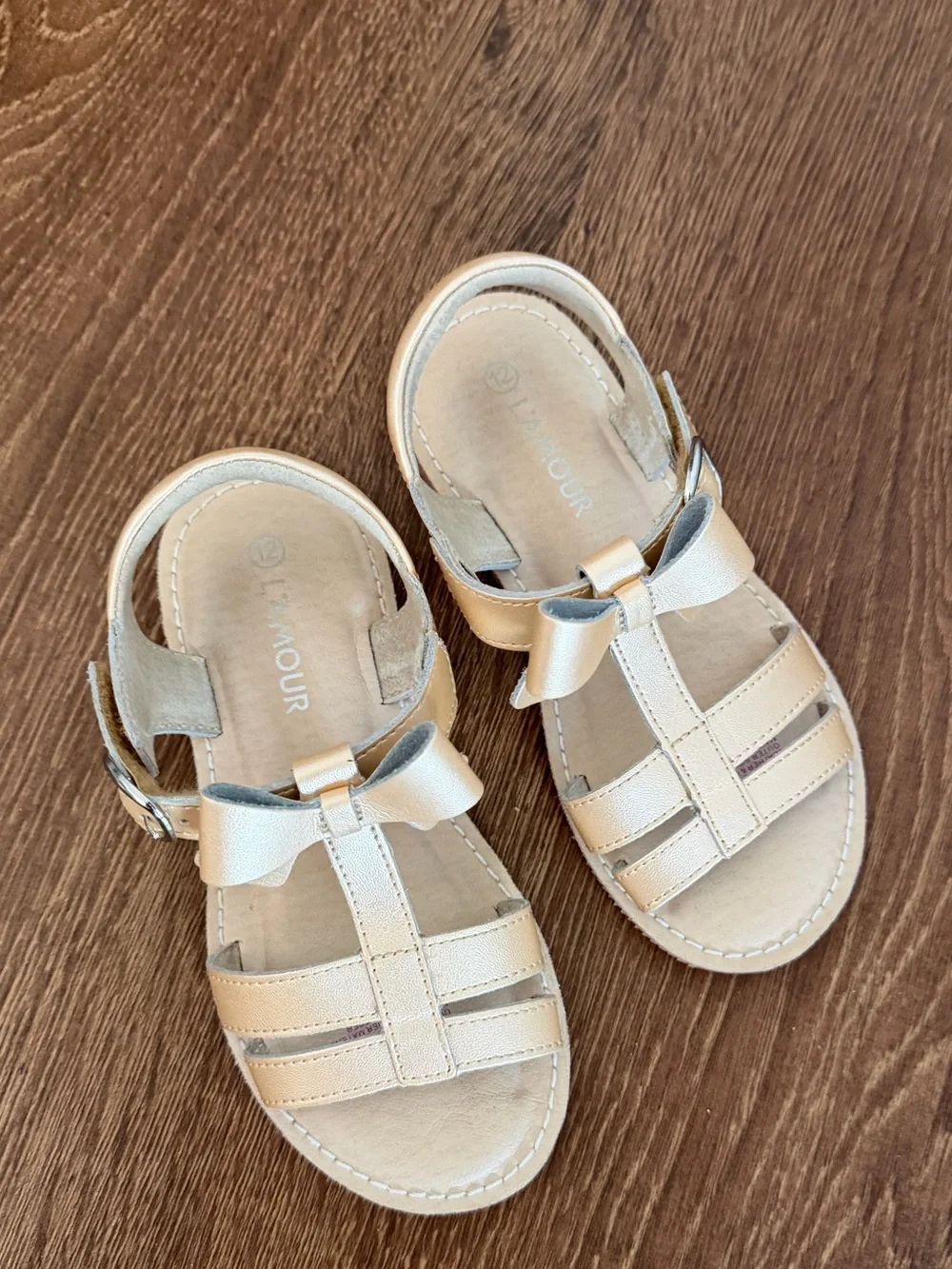 L'AMOUR SHOES Janie Champagne T-Strap Bow Sandal
